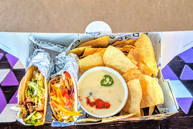 Bud Box, featuring two tacos, queso and chips - Photo: Provided by Condado Tacos