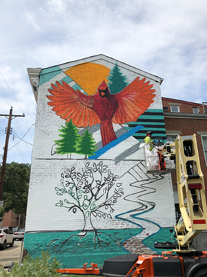 Skye Walker began work the on mural on Wednesday; the project wraps up Friday. - Photo: Provided