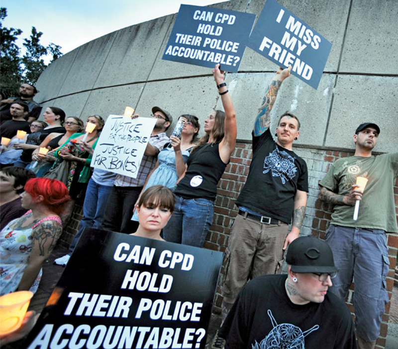 Protests over the 2011 police shooting death of David "Bones" Hebert.