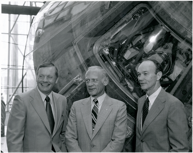 Apollo 11 astronauts Neil Armstrong, Buzz Aldrin and Michael Collins pose in front of the Columbia at the National Air and Space Museum in 1979. - Courtesy of National Air and Space Museum, Smithsonian Institution