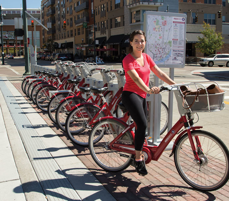 Lilith Wiest rents a Red Bike from a B-station at The Banks.