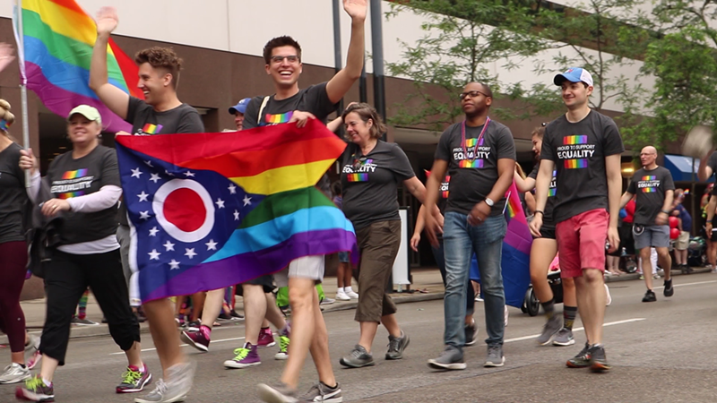 People walking in the Pride parade - Video still via Emma Stiefel