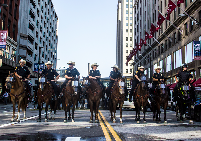 Mounted police moving to break up a protest against the RNC outside Quicken Loan Arena in Cleveland July 20 - Nick Swartsell