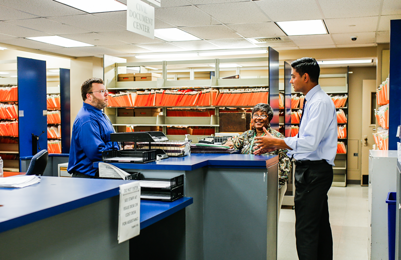 Aftab Pureval speaks with employees inside the Hamilton County Clerk of Courts July 10. - Photo: Hailey Bollinger