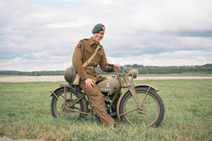 Man on vintage motorcycle - Photo: Patrick McCue