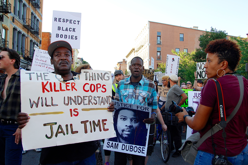Protesters march along Vine Street Saturday in memory of Sam DuBose - Nick Swartsell