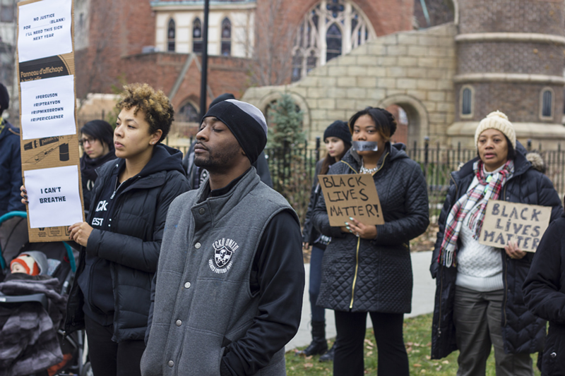 Marchers gather Saturday Dec. 13 in Washington Park to protest racial inequities in the justice system