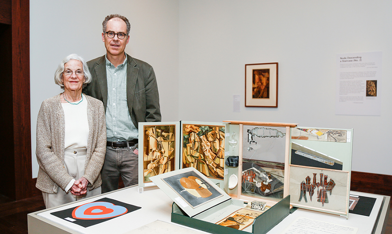 Anne and Jeffrey Harrison at the art museum with their donated Duchamp - PHOTO: Hailey Bollinger