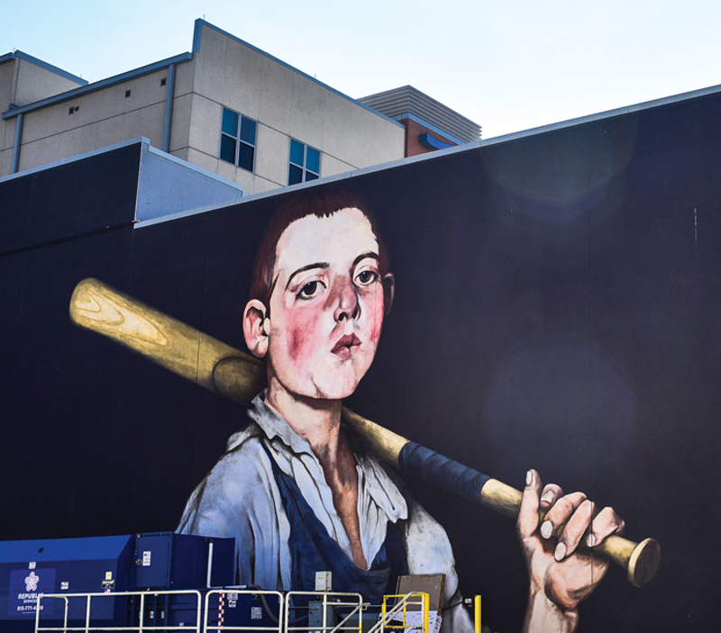 2011 mural "The Cobbler's Apprentice Plays Ball" combines an enlarged rendering of a Frank Duveneck painting with a baseball theme. - Photo: Jesse Fox