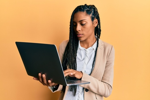 A study revealed Black women were more than 30% likely to receive a formal grooming policy in the workplace. - Photo: AdobeStock