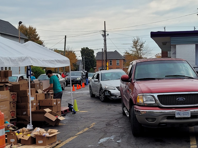Two lines of cars wait for food assistance at the All People's Fresh Market in Columbus. Officials say covid-related food insecurity is growing in Ohio. - Photo: Marty Schladen, Ohio Capital Journal