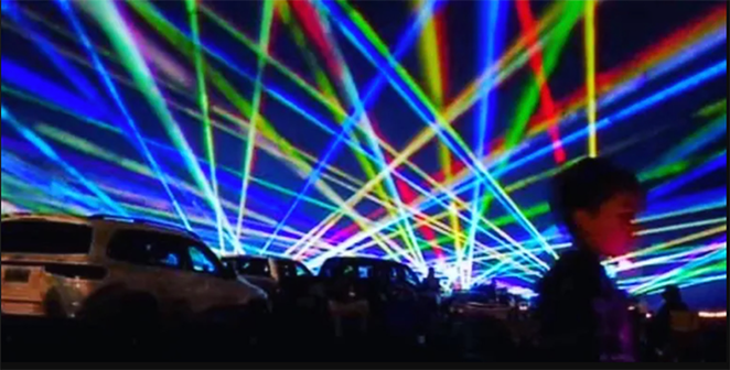 A drive-in-style laser light show will take over Coney Island's parking lot July 8-11. - Photo: cabinfeverlasershow.com