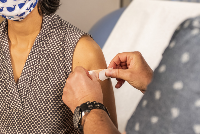 Social services organization El Centro is focused on removing all barriers to vaccination for Spanish-speaking clients. - Photo: CDC, Unsplash