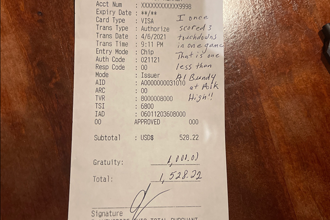 Chad Johnson's note and tip on the bill - PHOTO: TWITTER/OCHOCINCO