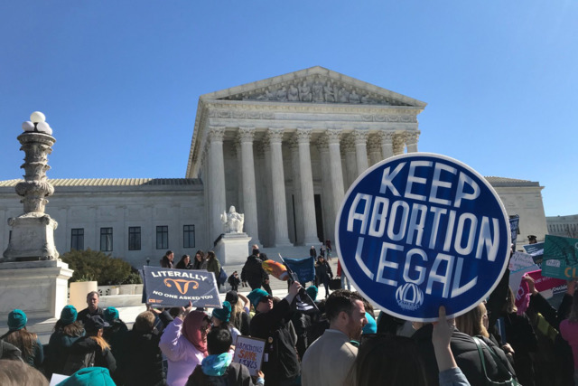Abortion rights activists rally outside of the U.S. Supreme Court. - Photo: Robin Bravender