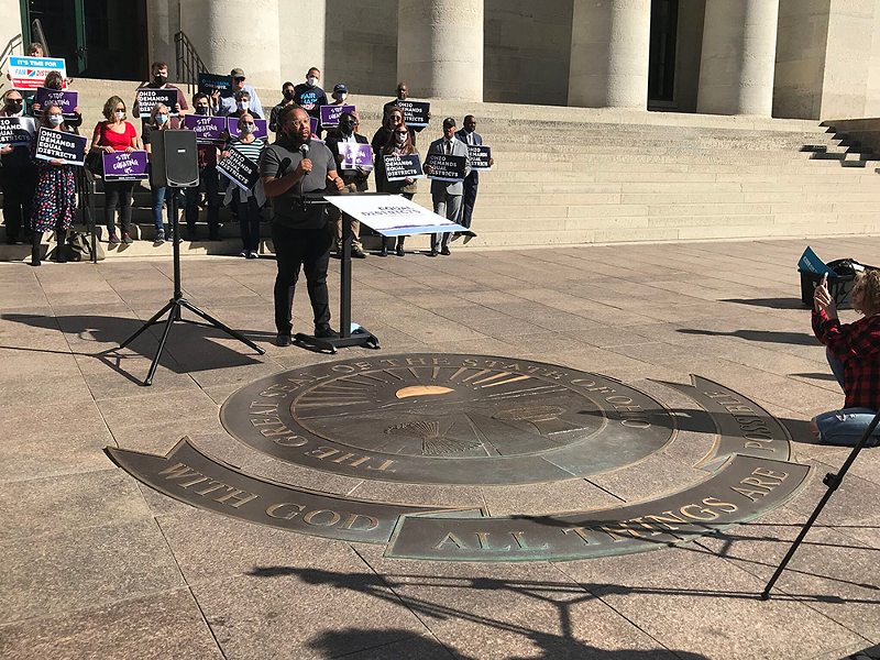 Prentiss Haney, co-executive director of the Ohio Organizing Collaborative, speaks at a rally for the Equal Districts Coalition. The coalition stood on the steps of the state capitol to urge public hearings on congressional redistricting. - Photo: Susan Tebben, OCJ.