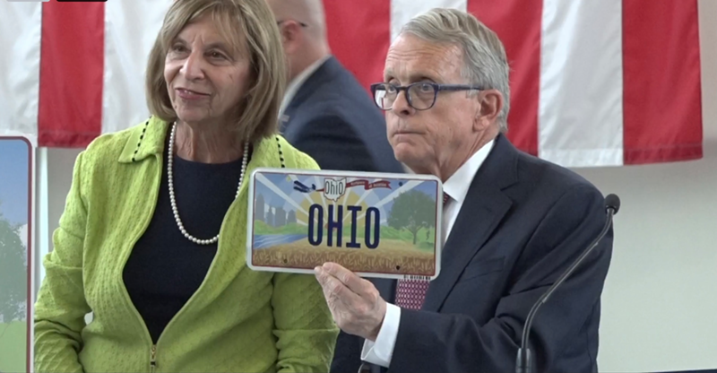 Ohio Gov. Mike DeWine reveals Ohio's new license plate design in October 2021. - The Ohio Channel