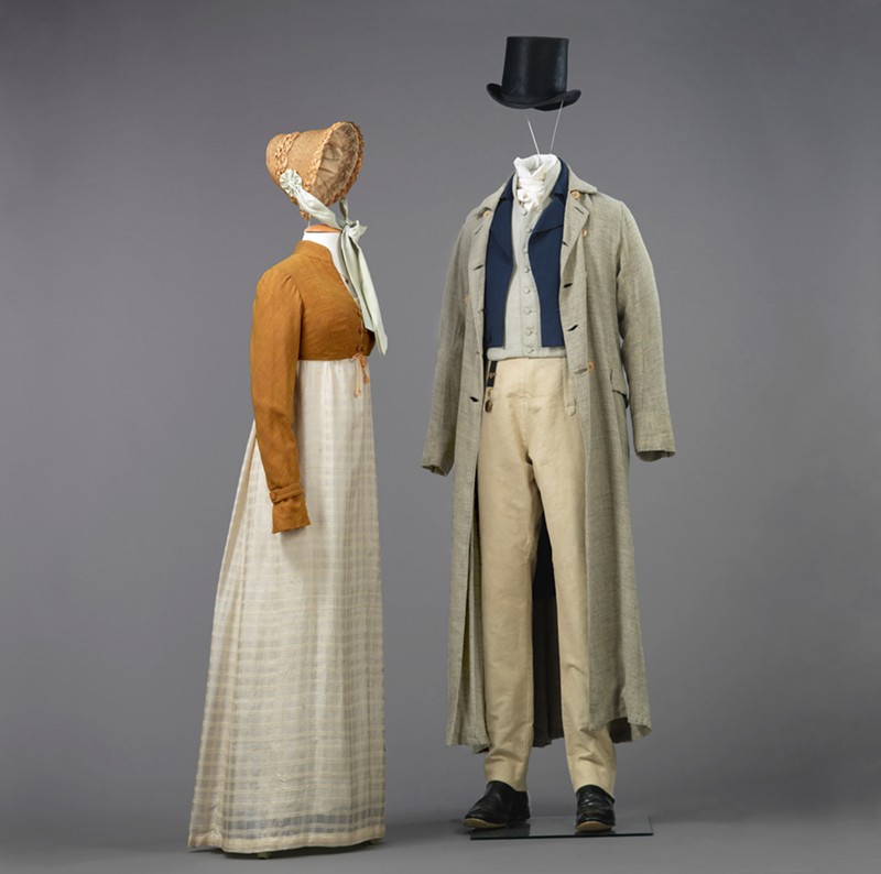 Left: Dress, Spencer, and Bonnet, Pride and Prejudice, 1995, Simon Langton, director. Worn by Jennifer Ehle as Elizabeth Bennet. Dinah Collin, costume designer. Right: - Duster, Tailcoat, Breeches, Shirt, and Top Hat, Pride and Prejudice, 1995, Simon Langton, director. Worn by Colin Firth as Mr. Fitzwilliam Darcy. Dinah Collin, costume designer. - Photo: provided by Taft Museum of Art