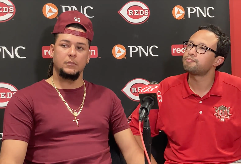 Pitcher Luis Castillo (left) and translator Jorge Merlos discuss Castillo's trade from the Cincinnati Reds to the Seattle Mariners on July 29, 2022. - Photo: Cincinnati Reds