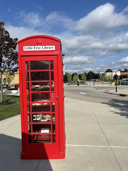 The Little Free Library in Deerfield Towne Center is made from a decorative telephone callbox. - Photo: Lindsay Wielonski