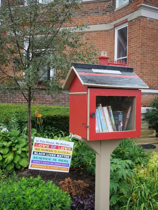 Alice Finkelstein’s Little Free Library in East Walnut Hills resembles her own house. - Photo: Allison Babka