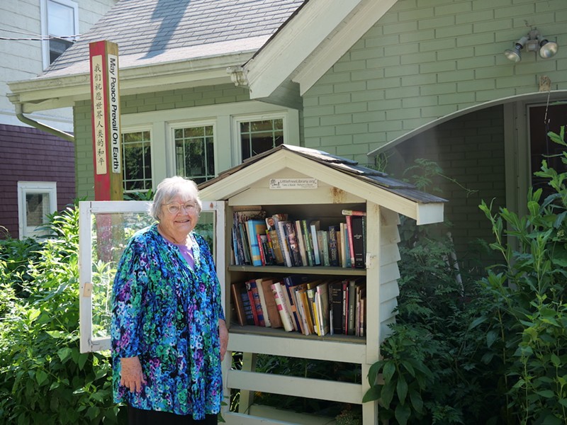 Jane O’Brien’s library in CUF complements her peace pole. - Photo: Allison Babka