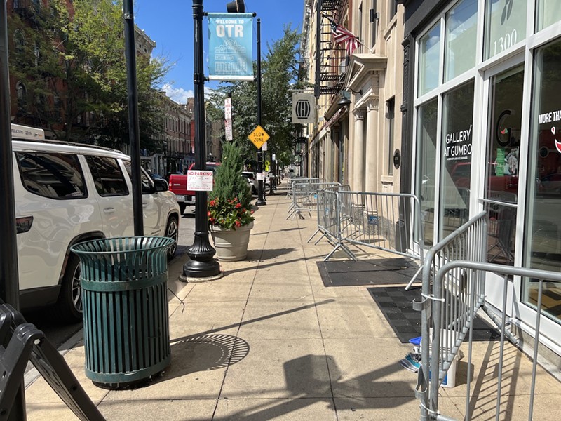 Metal barricades are placed along one side of a block of Main Street between East 13th and 14th streets on Aug. 16, 2022. City officials say the barricades cut down on large crowds gathering at night, but they remain up during the day to the consternation of residents and business owners. - Photo: by Madeline Fening