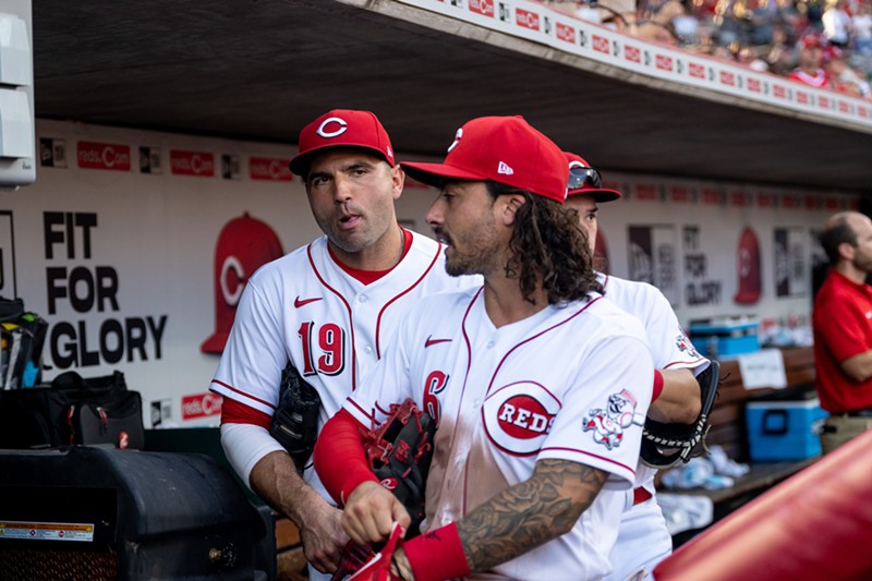 The Cincinnati Reds' Joey Votto (left) and Jonathan India head to the field during a game against the Miami Marlins on July 27, 2022. - Photo: Ron Valle