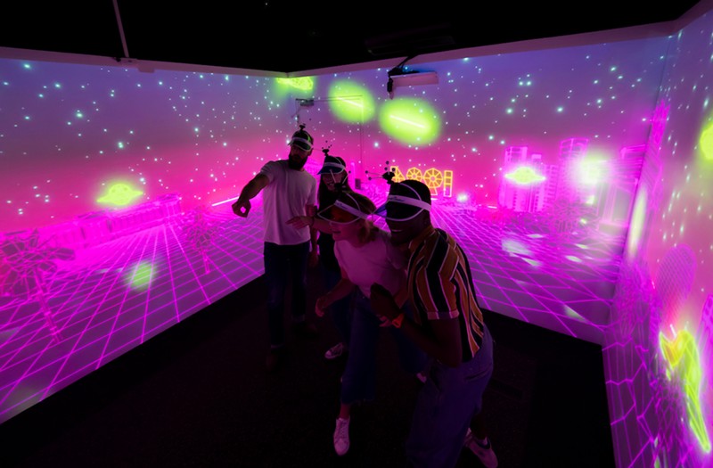 Immersive Gamebox games have players wear 3D motion-tracking visors to control interactive smart rooms, known as "gameboxes." - Photo: Provided by Immersive Gamebox