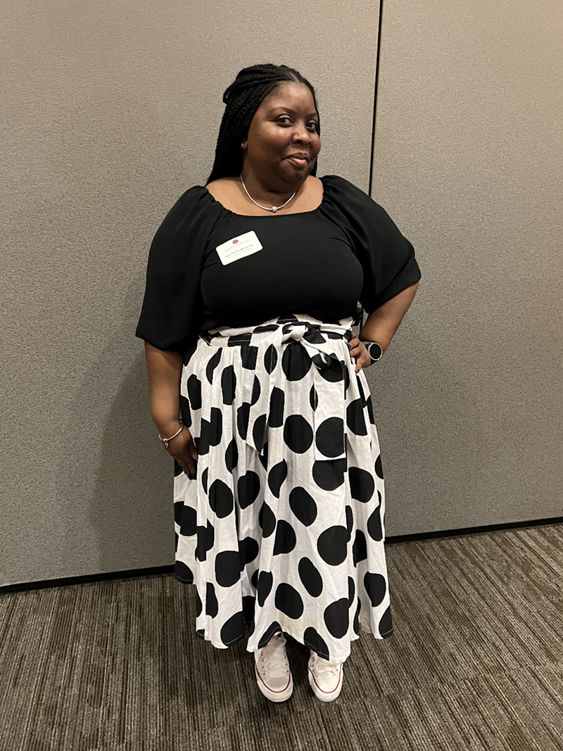 Antoinette Worsham, owner of Diva Defined Boutique in Northgate Mall, models her personal style at the Hamilton County Small Business Day event at the Sharonville Convention Center on May 22. - Photo: Madeline Fening