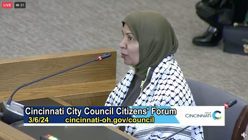 A guest speaker tells Cincinnati City Council that passing a permanent ceasefire resolution would "affirm our own city’s commitment to principles of human rights" during a March 6 meeting. - Photo: CitiCable