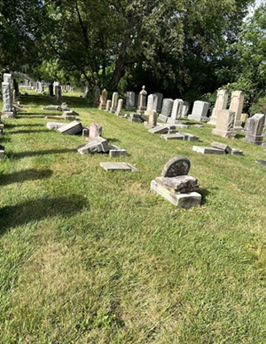 Jewish Cemeteries of Greater Cincinnati will notify the affected families once investigators give the go-ahead to lift the gravestones that were pushed face-down. - Photo: Provided by the Jewish Federation of Cincinnati