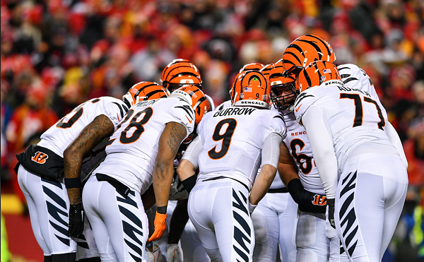 The Cincinnati Bengals huddle during the AFC championship game against the Kansas City Chiefs at Arrowhead Stadium on Jan. 29, 2023.