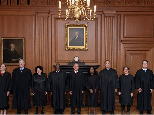 Members of the U.S. Supreme Court in the Justices’ Conference Room. From left to right: Associate Justices Amy Coney Barrett, Neil M. Gorsuch, Sonia Sotomayor, and Clarence Thomas, Chief Justice John G. Roberts, Jr., and Associate Justices Ketanji Brown Jackson, Samuel A. Alito, Jr., Elena Kagan and Brett M. Kavanaugh.
