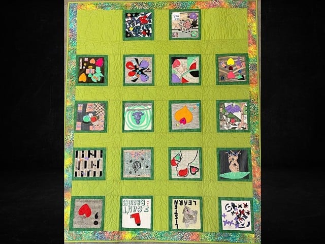Avondale, Joining Forces for Children, 2021.Quilted fabric. 44 x 54 in. Story Quilts: Community Conversations, Cincinnati, OH. Collection of Learning Through Art, Inc.