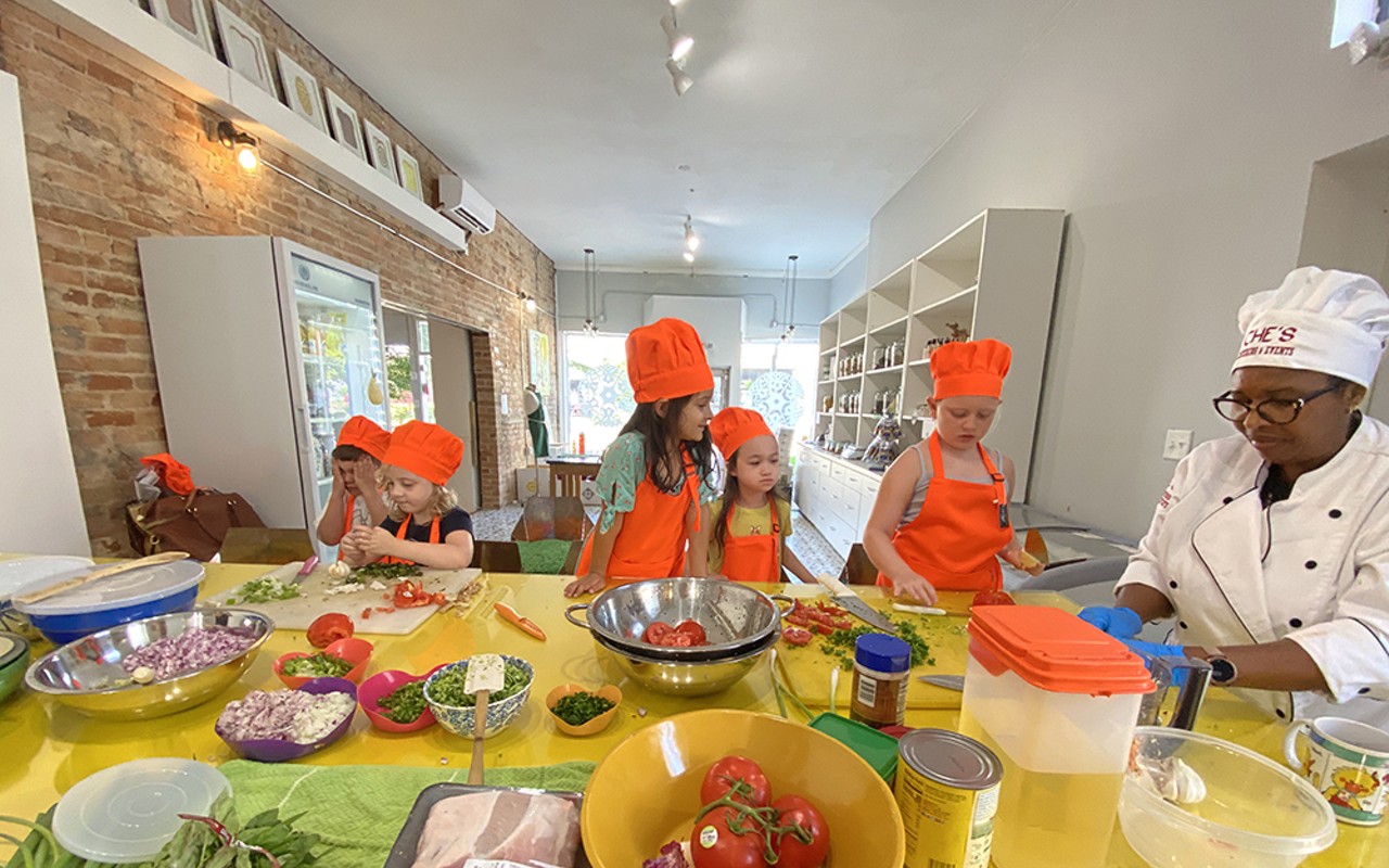 Chef Rose Che teaches a cooking class to kids at The Welcome Project.