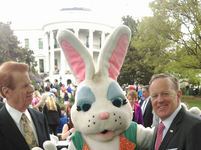 Jonn Schenz of local Schenz Theatrical Supply stands with the White House Easter Bunny and Spicey himself.