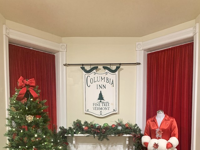 The original Columbia Inn sign from the film and Heather French Henry’s replica red dress