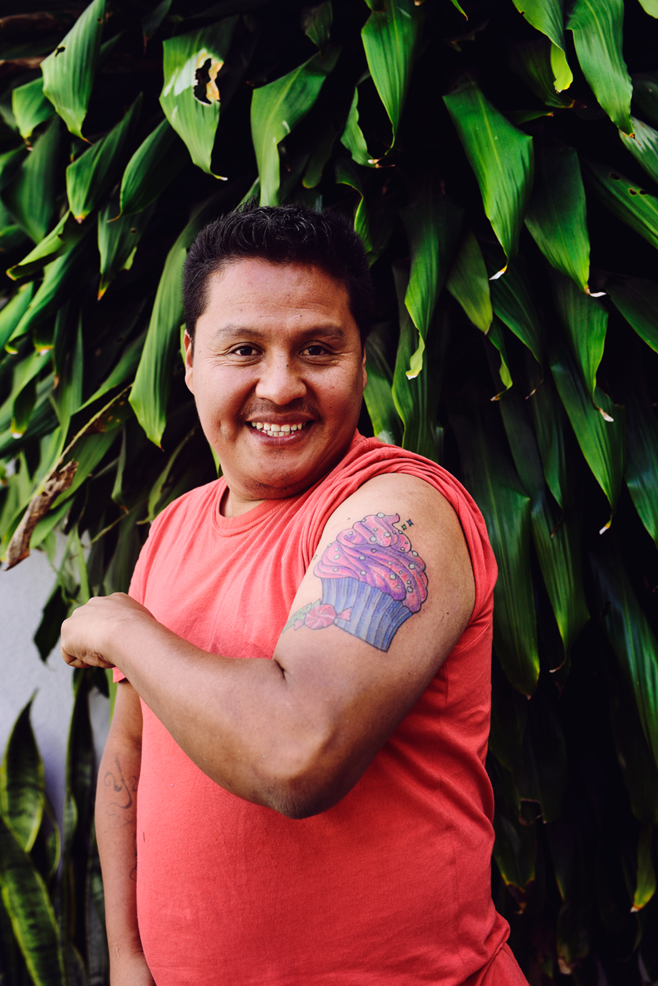 “Niki did Luis’ tattoo,” Becki says. “He was one of Fito’s crew still surviving from Zone 3. He left the gang and became a baker, and he sells pastries and candy on public transportation. He wanted to get his MS-13 tattoo covered up with a cupcake. Like a colorful cupcake — a pink and purple cupcake. Because he sells his pastries and candy on the bus, he always had to wear long-sleeve shirts because buses go throughout town and it’s dangerous for him to have a visible gang tattoo.”